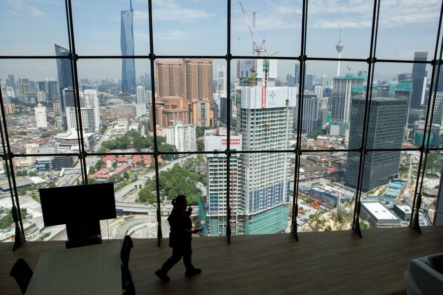 Commercial and residential buildings seen from an HSBC Bank Malaysia Bhd. branch in the bank's new headquarters in the Tun Razak Exchange (TRX) financial district in Kuala Lumpur, Malaysia, on 12 September 2022. (Samsul Said/Bloomberg)