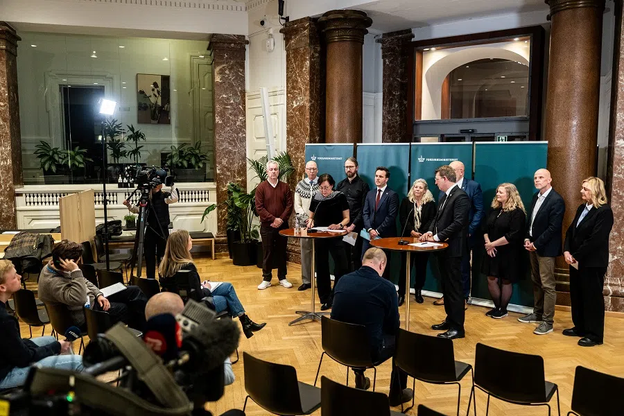 Greenland’s Minister for Independence and Foreign Affairs Vivian Motzfeldt, Denmark’s Minister of Defence Troels Lund Poulsen and members of the coalition present a defence agreement on the Arctic and North Atlantic in the Ministry of Defence in Copenhagen, Denmark, on 27 January 2025. (Ritzau Scanpix/Emil Helms via Reuters)