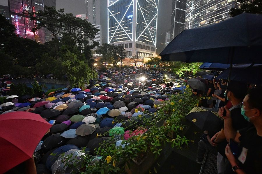 Chater Garden, in the heart of Hong Kong's business district, and its surrounding areas were turned into a sea of umbrellas, on 2 August 2019, as 13,000 civil servants gathered despite an evening shower to show their support for the anti-extradition movement. (SPH)