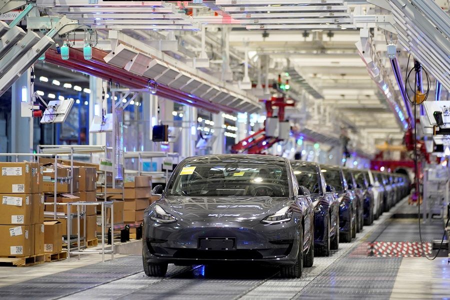 Tesla China-made Model 3 vehicles are seen during a delivery event at its factory in Shanghai, China, 7 January 2020. (Aly Song/File Photo/Reuters)