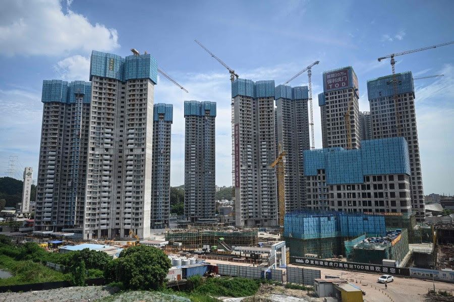 This photo taken on 13 July 2022, shows a housing complex under construction in Dongguan, in China's southern Guangdong province. (Jade Gao/AFP)