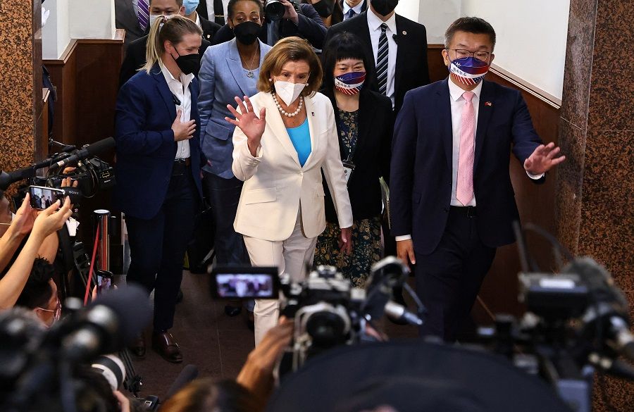 US House Speaker Nancy Pelosi walks as she leaves the parliament in Taipei, Taiwan, 3 August 2022. (Ann Wang/Reuters)