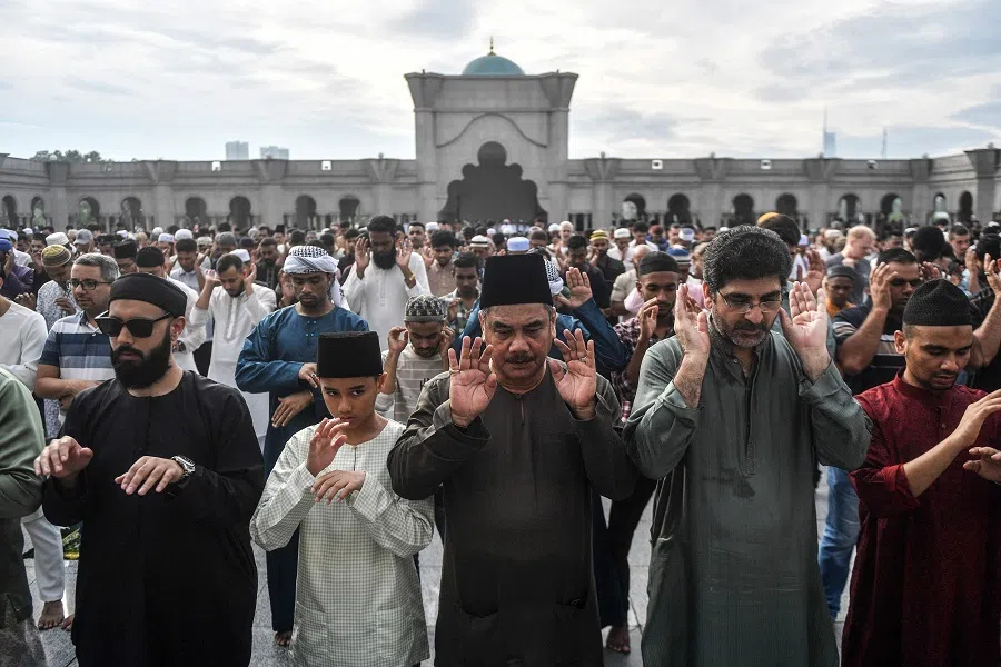Muslim perform Eid Al-Fitr prayers, marking the end of the holy month of Ramadan, at the Federal Territory mosque in Kuala Lumpur on 10 April 2024. (Arif Kartono/AFP)