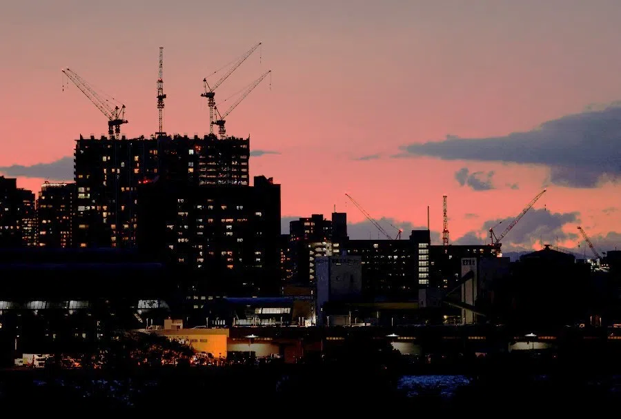 High-rise buildings under construction are seen in Tokyo, Japan, on 30 November 2023. (Issei Kato/Reuters)