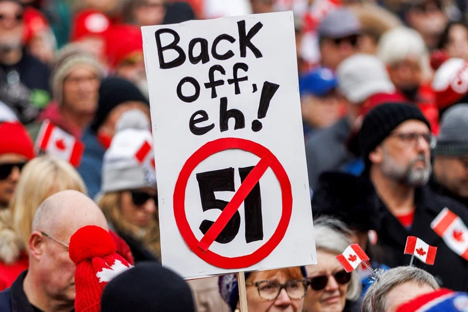 Canadians hold an “Elbows Up” protest against US tariffs and other policies by US President Donald Trump, at Nathan Phillips Square in Toronto, Ontario, Canada on 22 March 2025. (Carlos Osorio/Reuters)