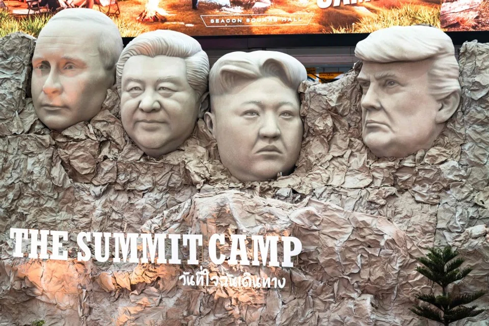 A parody Mount Rushmore sculpture depicts the faces of (left to right) Russia’s President Vladimir Putin, China’s President Xi Jinping, North Korea’s leader Kim Jong Un and US President Donald Trump at “The Summit Camp” camping and outdoors experience at a shopping mall in Bangkok on 24 September 2025. (Chanakarn Laosarakham/AFP)