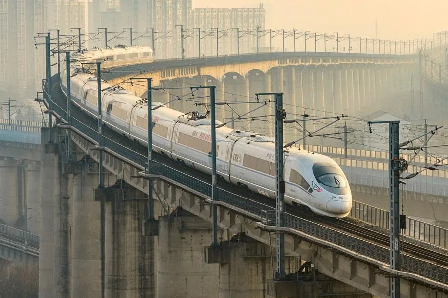 A high-speed train runs on elevated tracks in Nanjing, in China’s eastern Jiangsu province on 25 January 2026. (AFP)