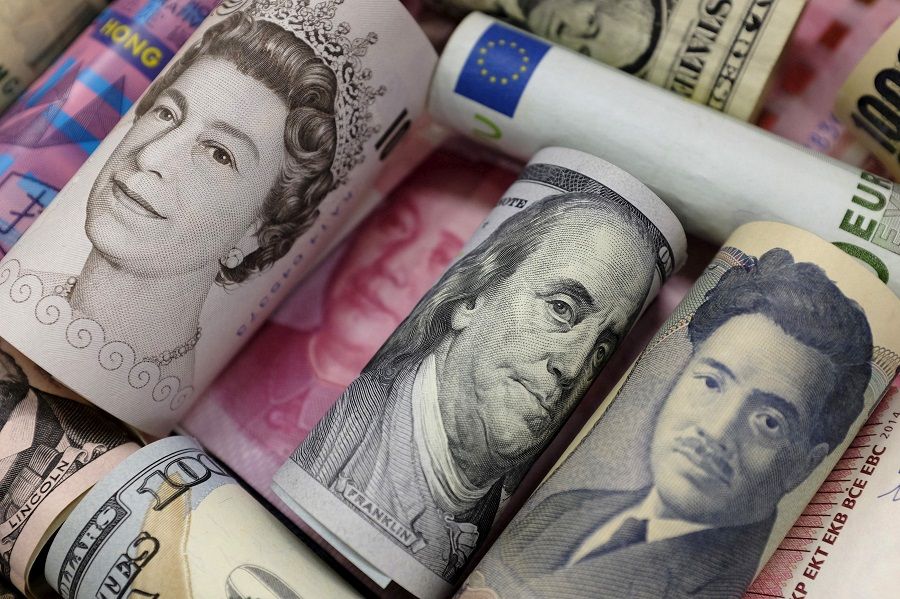 A picture illustration of the banknotes of the euro, HK dollar, US dollar, Japanese yen, British pound and Chinese yuan. (Jason Lee/File Photo/Reuters)