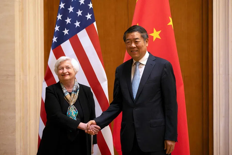 US Secretary of the Treasury Janet Yellen (left) shakes hands with Chinese Vice-Premier He Lifeng during a meeting at the Diaoyutai State Guesthouse in Beijing, China, on 8 July 2023. (Mark Schiefelbein/Pool/AFP)