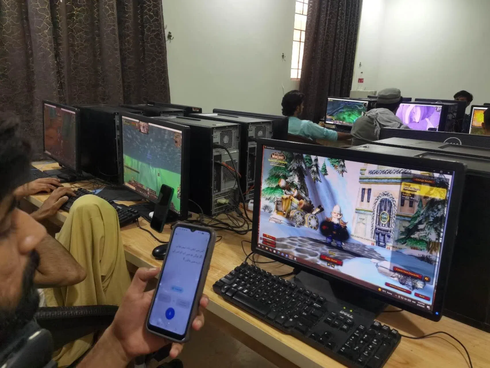 Game boosters work on their tasks in World of Warcraft.