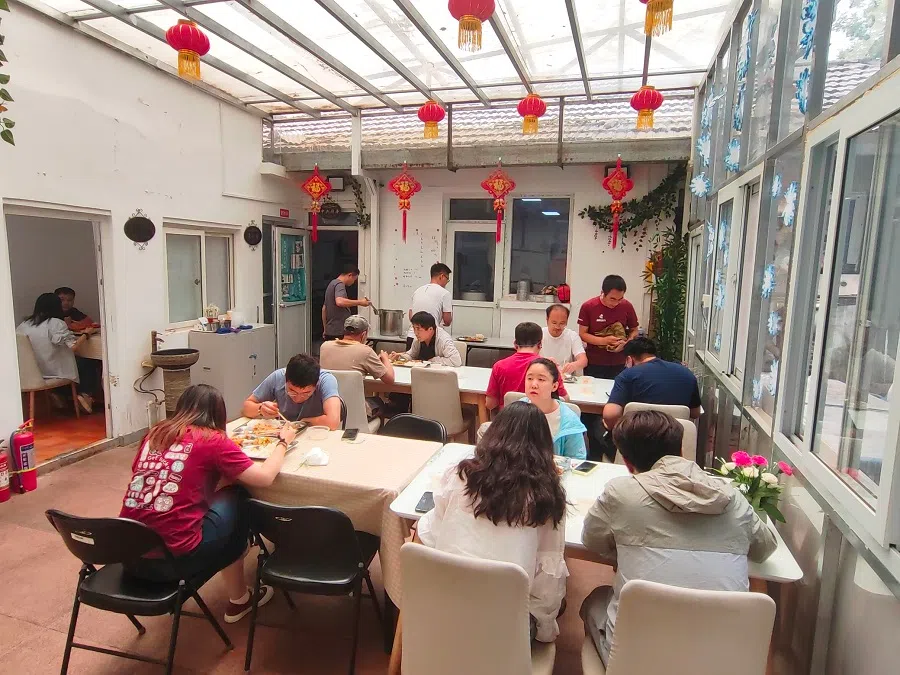 People having a meal at a community canteen in Beijing.