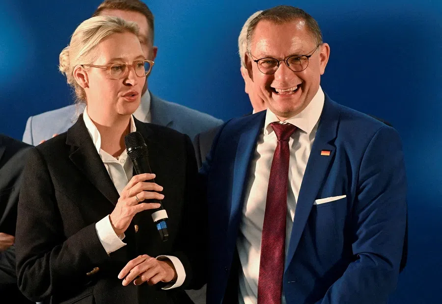 Germany’s Alternative for Germany (AfD) party co-leaders Alice Weidel and Tino Chrupalla react during a press conference at a party convention in Essen, Germany, on 29 June 2024. (Jana Rodenbusch/Reuters)