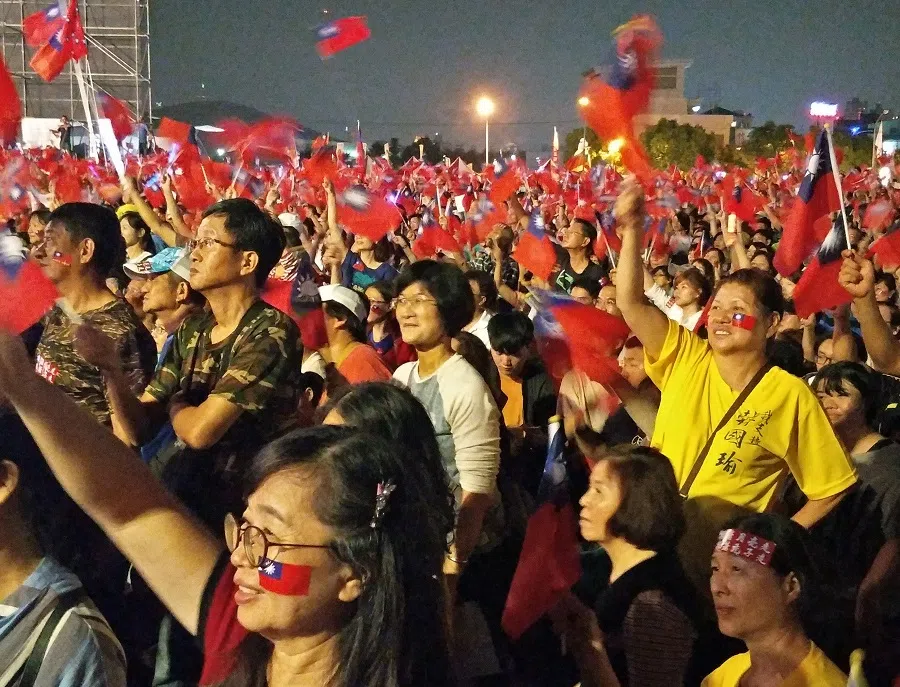 A sea of Han Kuo-yu supporters is seen waving the island's blue-and-red flags during a Kaohsiung mayoral campaign rally on 17 November 2018. (Lee Seok Hwai/SPH)
