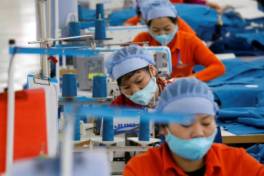 Women work at Hung Viet garment export factory in Hung Yen province, Vietnam, 30 December 2020. (Kham/Reuters)