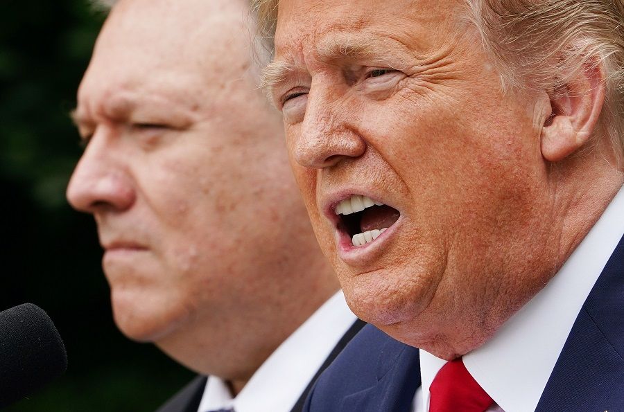 US President Donald Trump, with US Secretary of State Mike Pompeo, holding a press conference on China on 29 May 2020, in the Rose Garden of the White House in Washington, DC. (Mandel Ngan/AFP)