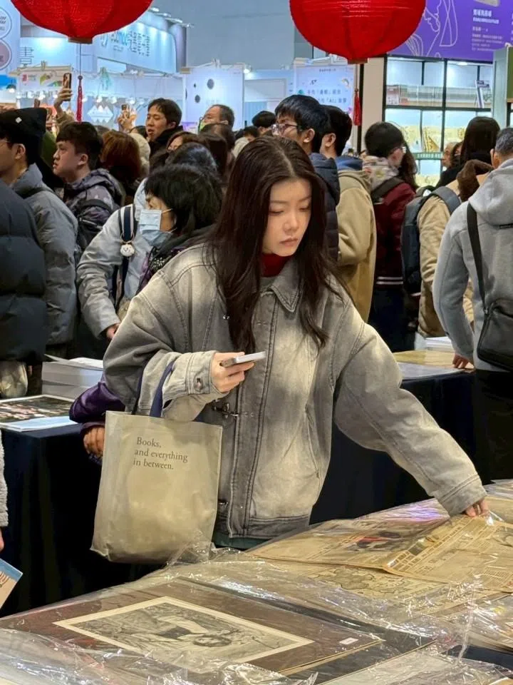 A display of newspapers and periodicals from World War II.