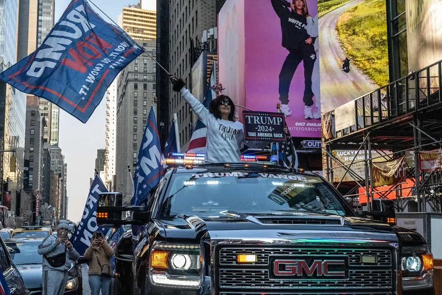 People participate in a car caravan in support of US President-elect Donald Trump on 9 November 2024 in New York City. (Stephanie Keith/Getty Images via AFP)