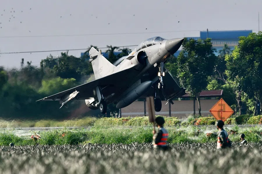 An armed French made Mirage fighter jet takes off from a motorway in Pingtung, Taiwan, during the annual Han Kuang drill on 15 September 2021. (Sam Yeh/AFP)