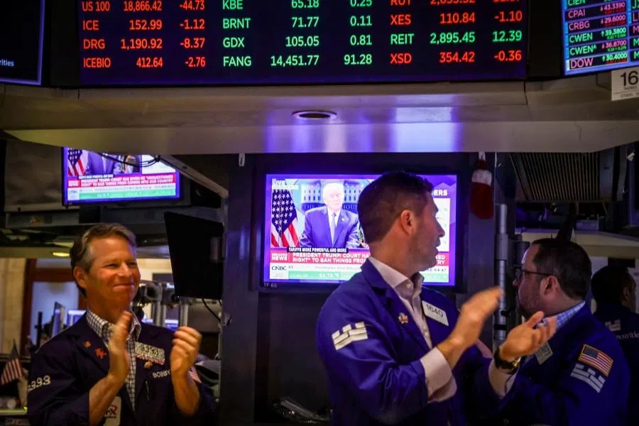 A television station broadcasts US President Donald Trump during a news conference after the US Supreme Court struck down Trump’s global tariffs on the floor of the New York Stock Exchange (NYSE) in New York, US, on 20 February 2026. (Michael Nagle/Bloomberg)