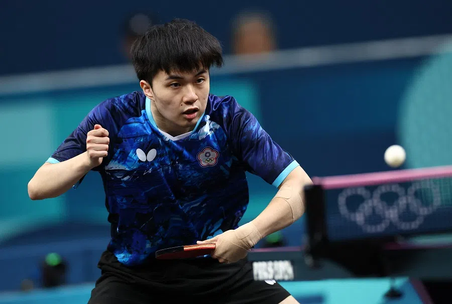 Lin Yun-ju of Chinese Taipei in action during his quarter-final match against Tomokazu Harimoto of Japan, South Paris Arena 4, Paris, France, on 6 August 2024. (Piroschka Vandewouw/Reuters)