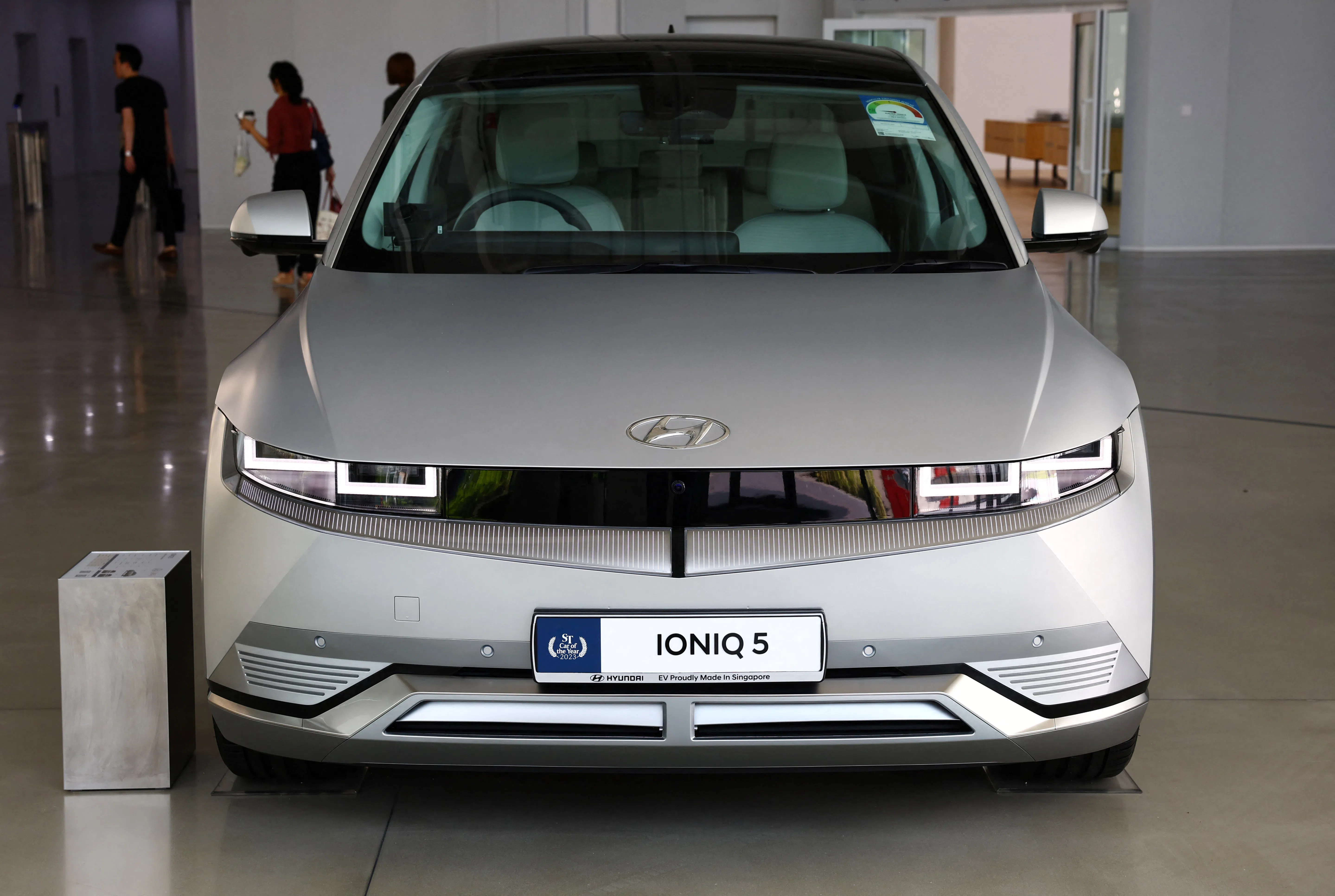 A Hyundai Ioniq 5 EV is displayed at the Hyundai Motor Group Innovation Center Singapore (HMGICS) in Singapore, on 14 June 2024. (Edgar Su/ Reuters)