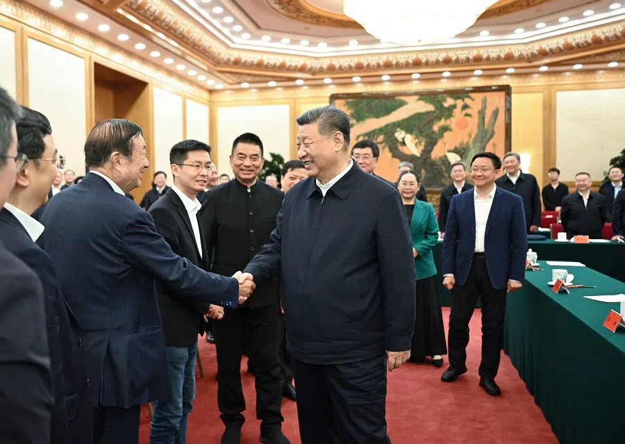 Xi Jinping shakes hands with attendees at a symposium with private entrepreneurs, on 17 February 2025.