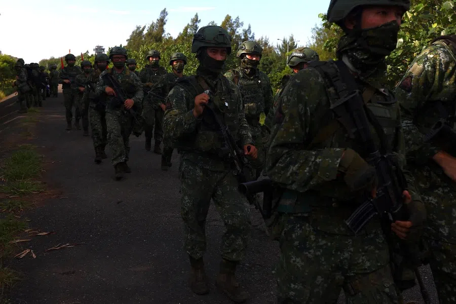 Soldiers march during the annual Han Kuang military drill in Tainan, Taiwan, 14 September 2021. (Ann Wang/Reuters)