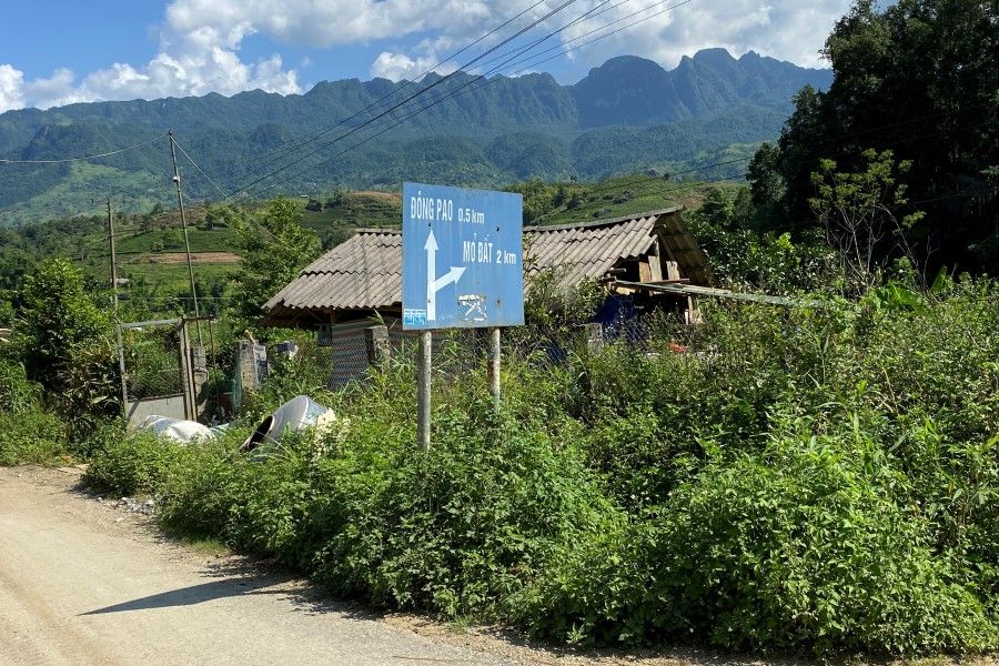 An undated photo shows a signboard showing the way to Dong Pao mine in Lai Chau province in Vietnam. (Reuters)
