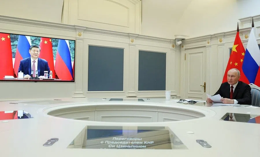 Russia's President Vladimir Putin holds talks with China's President Xi Jinping via video link from Moscow, Russia, on 4 February 2026. (Sputnik/Vyacheslav Prokofyev/Pool via Reuters)