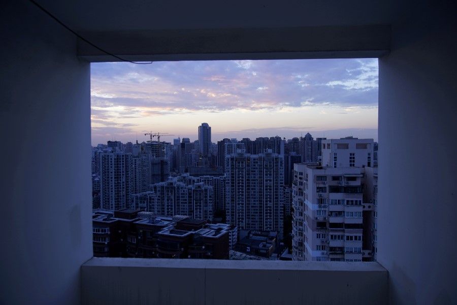 Buildings of residential compounds are seen in Shanghai, China, 11 August 2020. (Aly Song/REUTERS)