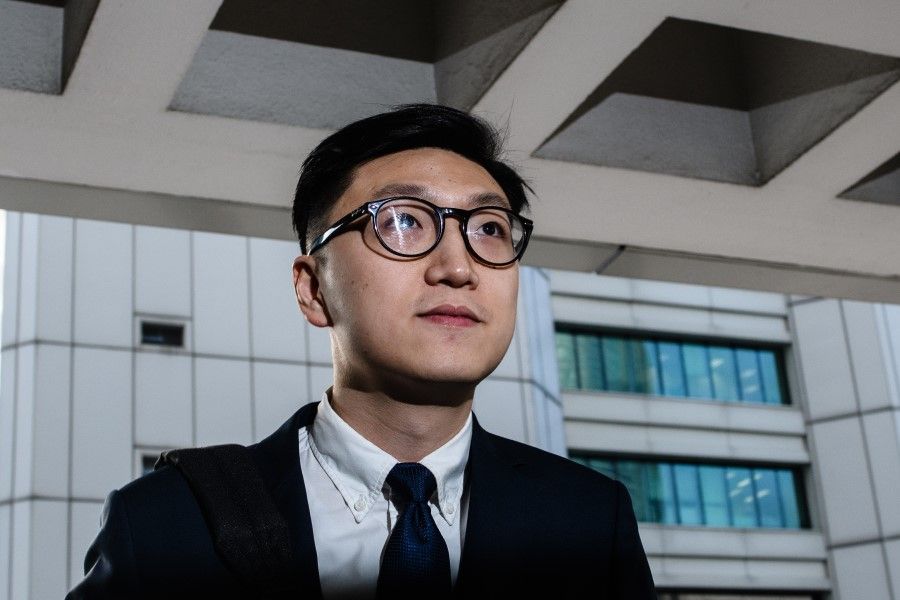 Pro-independence protestor Edward Leung arrives at the High Court before facing rioting charges in Hong Kong on January 18, 2018, for his part in the 'fishball riots' that took place in February 2016. (Anthony Wallace/AFP)
