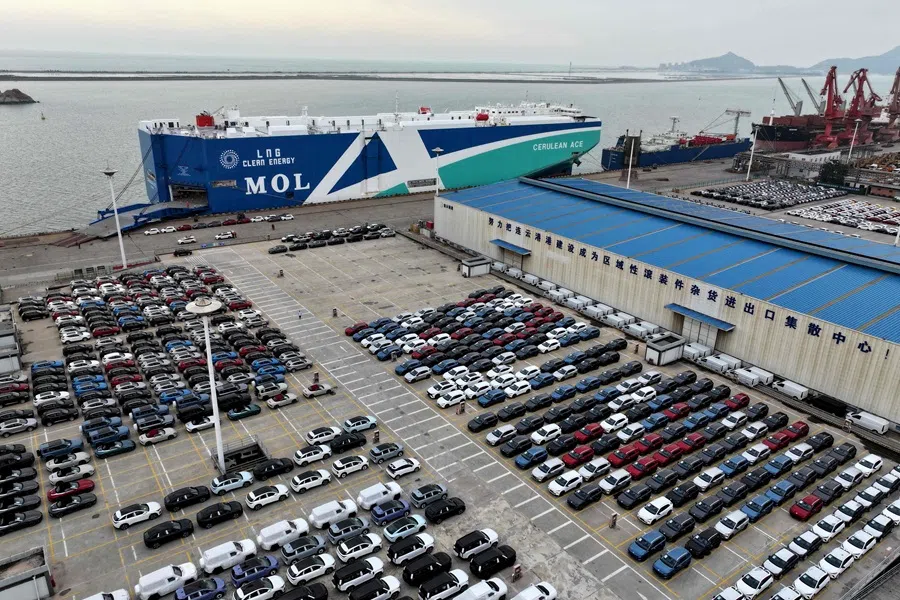 Cars are seen at the port in Lianyungang, in China’s eastern Jiangsu province before being loaded onto a ship for export on 25 September 2025. (AFP)