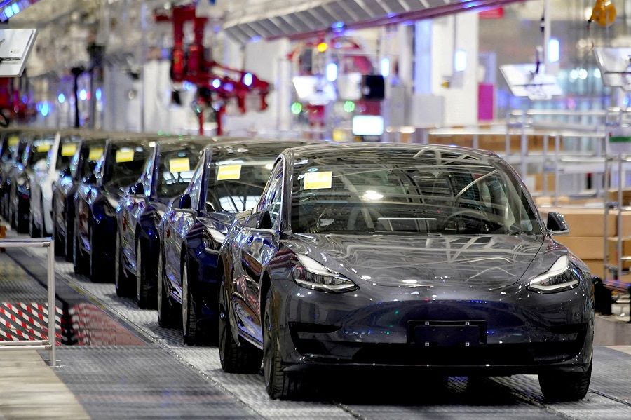 Tesla's China-made Model 3 vehicles are seen during a delivery event at the carmaker's factory in Shanghai, China, 7 January 2020. (Aly Song/File Photo/Reuters)