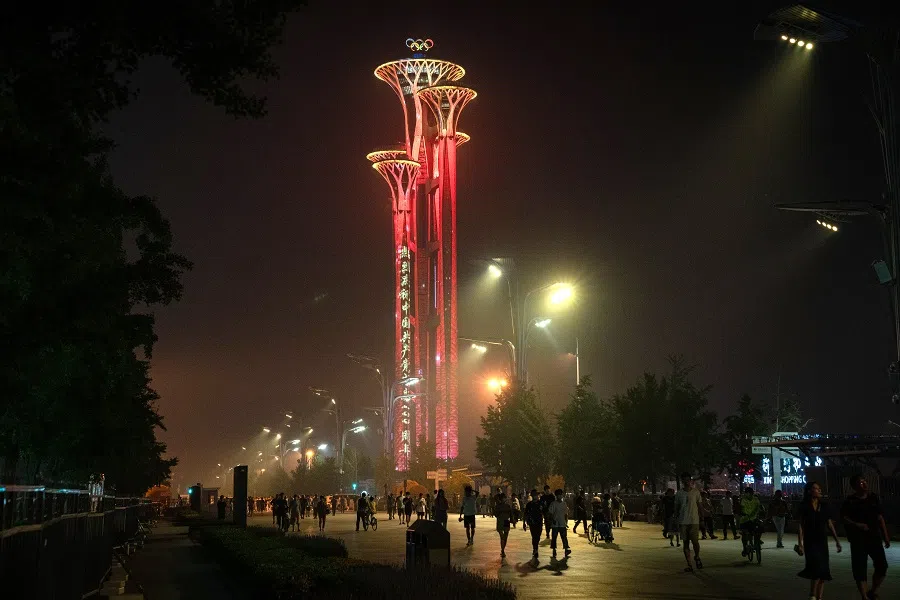 A message celebrating the centenary of the Chinese Community Party illuminates the Beijing Olympic Tower in Beijing, China on 26 June 2021. (Yan Cong/Bloomberg)