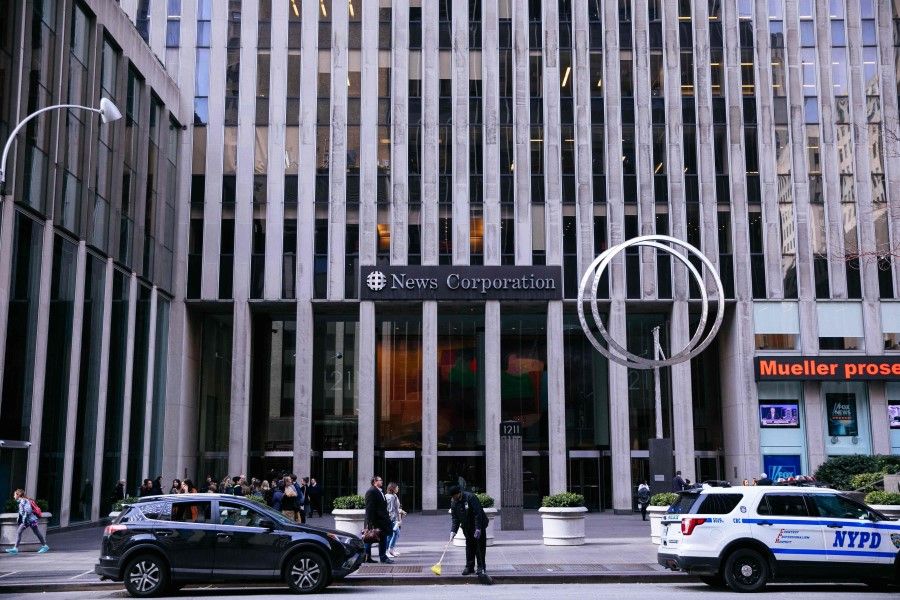 The News Corporation building on 6th Avenue, New York City, home to Fox News, the New York Post and the Wall Street Journal. China effectively expelled journalists from the WSJ, New York Times, and Washington Post. (Kevin Hagen/AFP)