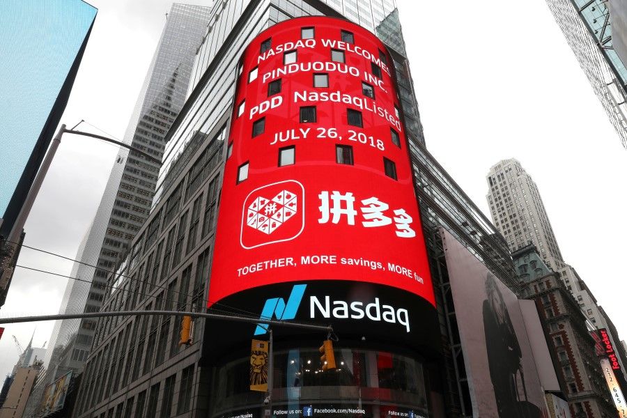 A display at the Nasdaq Market Site shows a message after Chinese online group discounter Pinduoduo Inc. (PDD) was listed on the Nasdaq exchange in Times Square in New York City, New York, U.S., 26 July 2018. (Mike Segar/REUTERS)