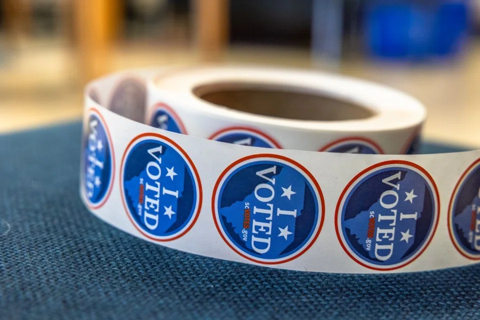 Stickers at a polling station in Rock Hill, South Carolina, US, on 3 February 2024. Democrats are holding their primary on February 3, and while Biden is expected to win, he is using the race as a chance to quiet his critics and demonstrate strength among key voter groups. (Grant Baldwin/Bloomberg)