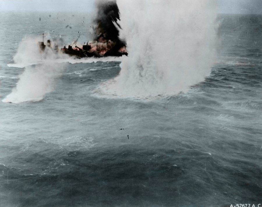 A Japanese corvette explodes after being hit by a B-25 bomber of the 345th Bombardment Group, Fifth Air Force, about 30 miles south of Xiamen, 6 April 1945. The explosive ripples in the water indicates the intensity of the bombing.