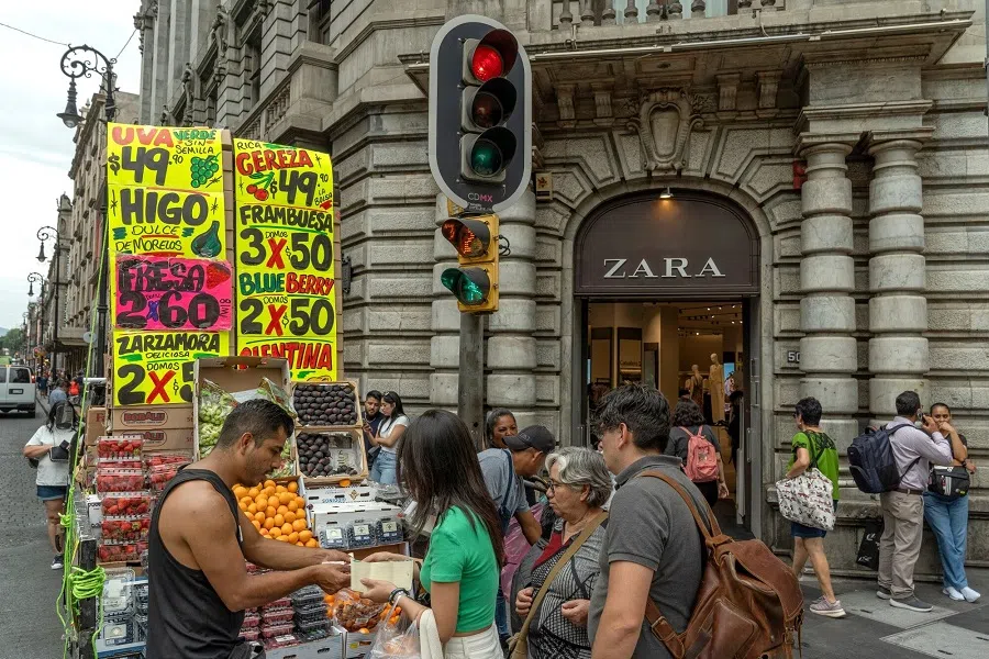 A fruit stand in front of a Zara store in Mexico City, Mexico, on 19 June 2024. (Alejandro Cegarra/Bloomberg)