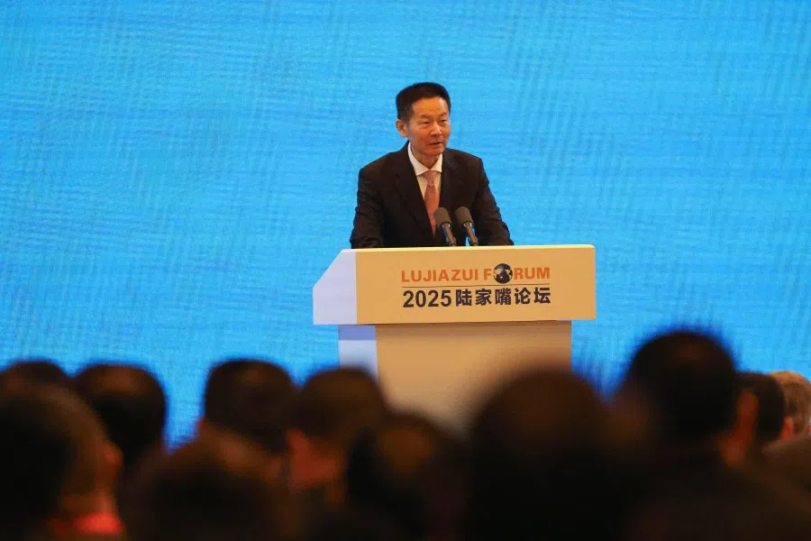 Wu Qing, Chairman of China Securities Regulatory Commission, speaks during the Lujiazui Forum 2025 in Shanghai, China, on 18 June 2025. (Brenda Goh/Reuters)