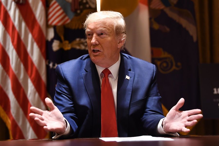 US President Donald Trump speaks during a meeting with the Governors of Colorado and North Dakota on 13 May 2020, in the Cabinet Room of the White House in Washington, D.C. (Brendan Smialowski/AFP)