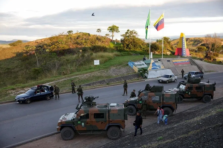 Brazilian military vehicles at the border between Venezuela and Brazil, after the US launched an attack on Venezuela, capturing its president, Nicolas Maduro, and his wife, Cilia Flores, in Pacaraima, Roraima, Brazil, 5 January 2026. (Bruno Kelly/Reuters)