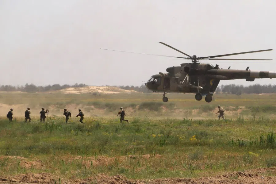 Ukrainian army servicemen take part in the Sea Breeze drills at the shooting range in the Kherson region of Ukraine on 2 July 2021. Ukraine and the US launched joint naval exercises in the Black Sea on 28 May 2021 in a show of Western cooperation with Kiev as it faces off with Russia. The drills come just days after the British Navy's HMS Defender passed near Russian-annexed Crimea in the Black Sea, with Moscow saying it fired warning shots at the destroyer to ward it off. (Oleksandr Gimanov/AFP)