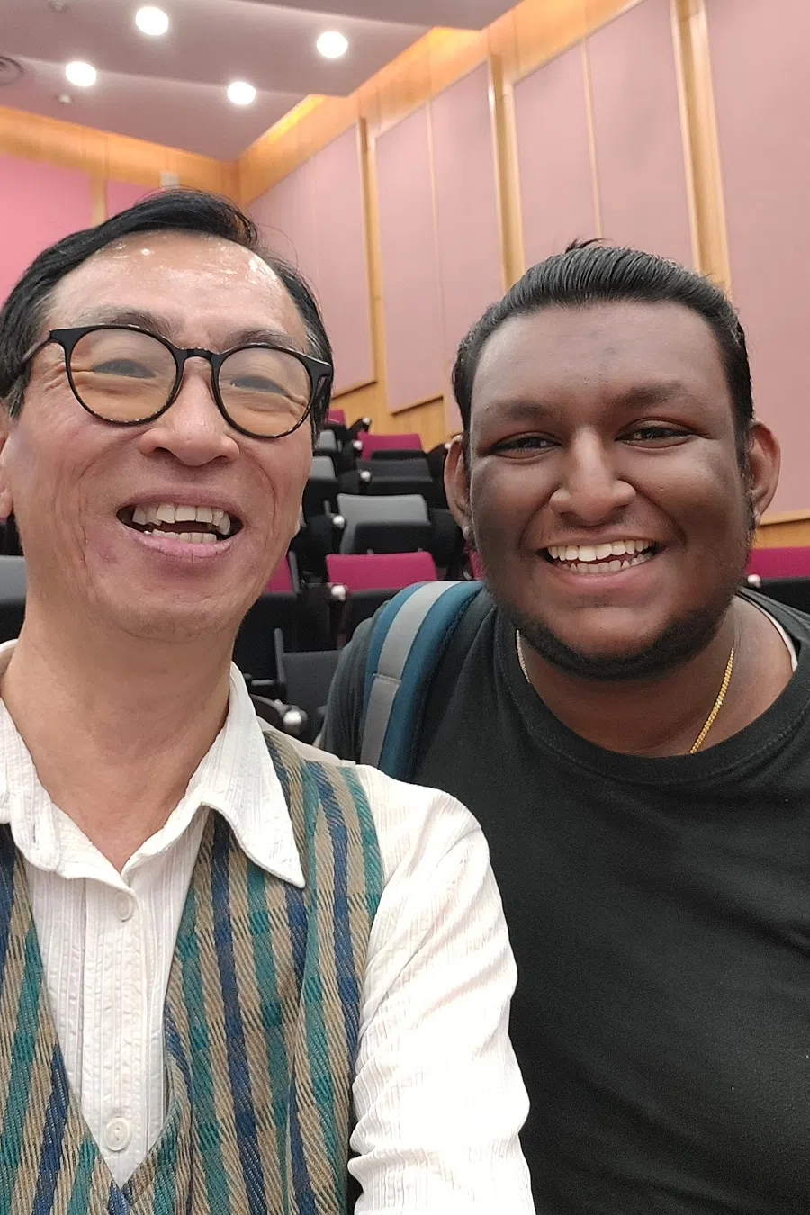 Singaporean Indian student at NUS Yuknavell Thiyagarajan (right) poses for a photo with Sew Jyh Wee, the NUS lecturer who taught him conversational Cantonese dialect, in March 2024. (Provided by Sew Jyh Wee)