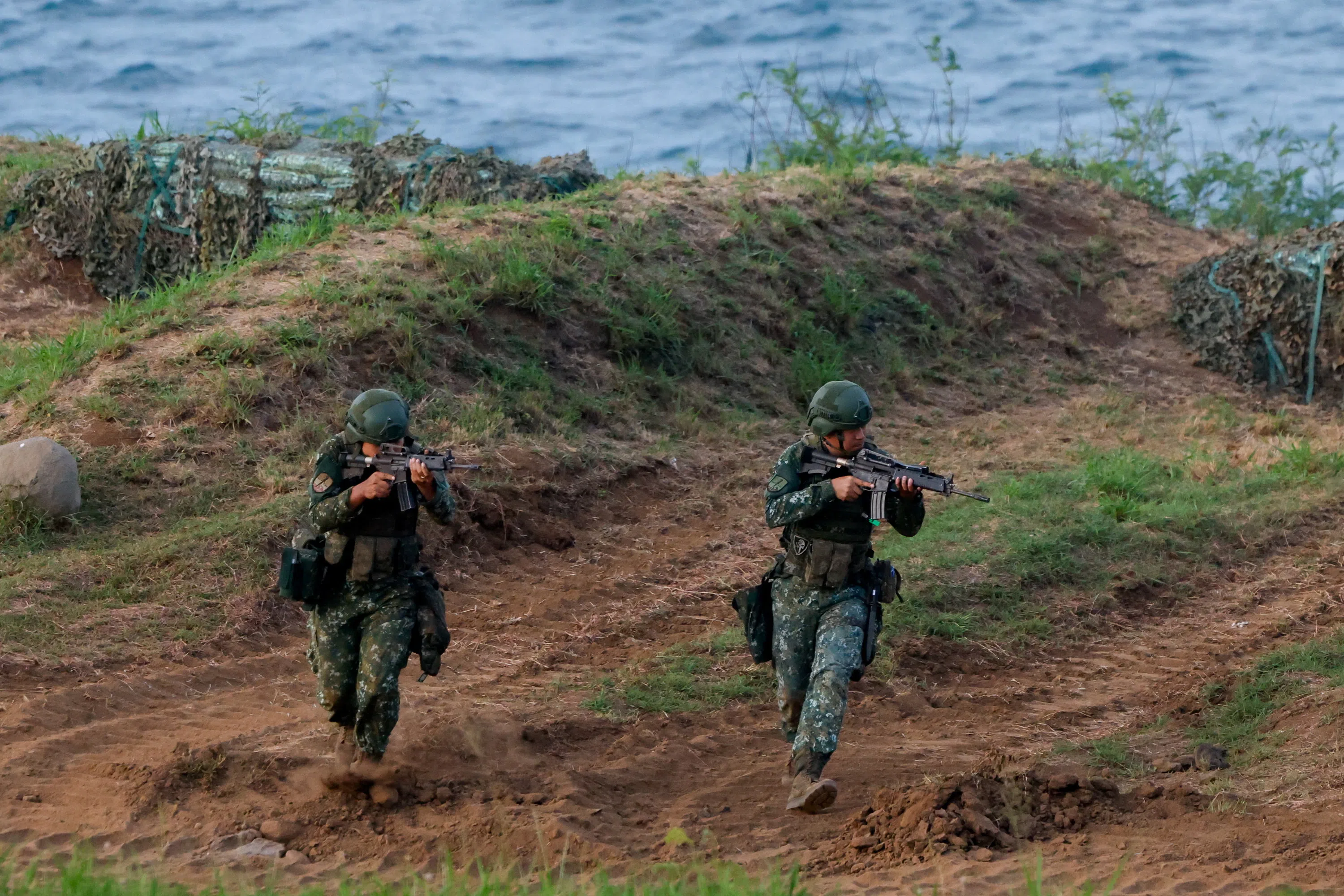 Taiwanese soldiers participate in a live-fire drill during the Han Kuang military exercise in Penghu, Taiwan, on 10 August 2026.