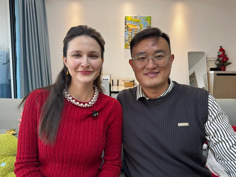 Gao Shihui, from Shandong, China, with his wife Evdokimova Daria, from Russia. (Sim Tze Wei/SPH Media)