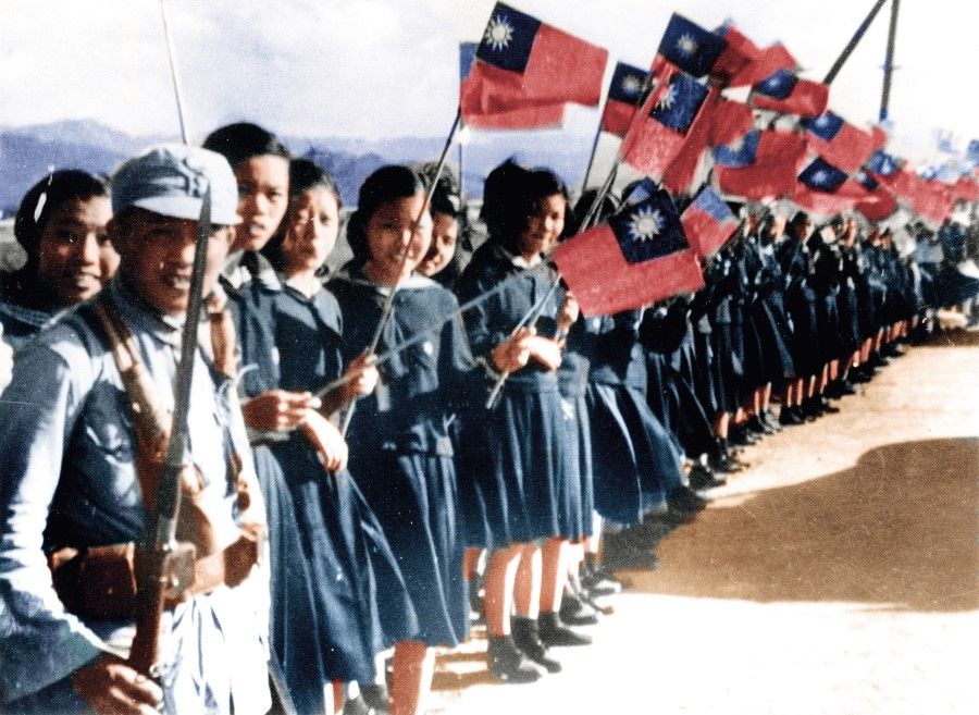 Chinese troops being warmly welcomed by Taiwanese female students on arrival in Taiwan following Taiwan's liberation, October 1945. After 50 years of colonial rule under Japan, the Taiwanese celebrated the moment of returning to the motherland. While running his revolution, Sun Yat-sen visited Taiwan three times, and the Hsing Chung Hui (兴中会, Revive China Society) also owed its beginnings to the First Opium War, which made Taiwan's liberation an important achievement in realising Sun's legacy.