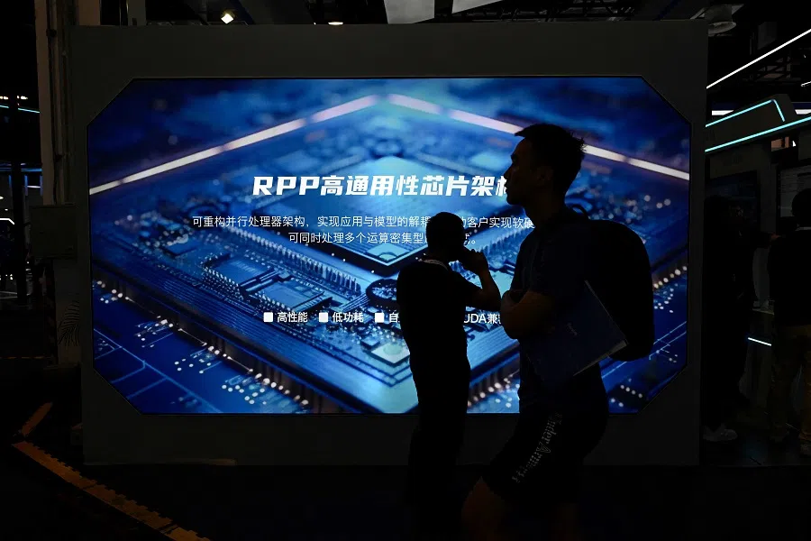 People visit the World Artificial Intelligence Conference (WAIC) in Shanghai on 6 July 2023. (Wang Zhao/AFP)
