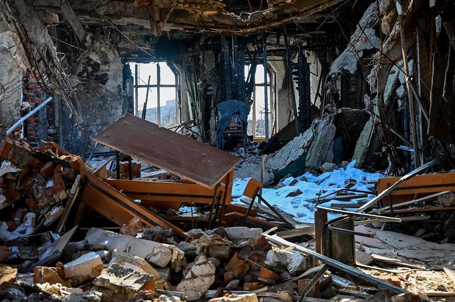 This photograph taken on 22 February 2023 shows damages in the building of Kharkiv University in Kharkiv, Ukraine, amid the Russian invasion of Ukraine. (Sergey Bobok/AFP)
