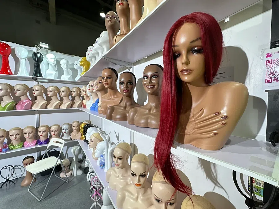 Wig sales to Africa is growing steadily. (Daryl Lim/SPH Media)